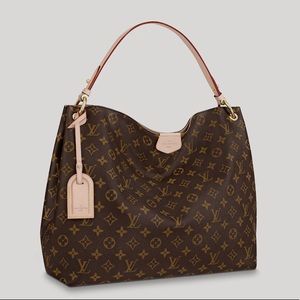 Graceful MM with fuchsia lining! Very good condition!